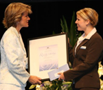 Kathryn receives her commendation from Federal Education Minister Julie Bishop in Canberra.