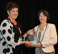 CSU's Professor Sharynne McLeod (right) receives the 2013 Elizabeth Usher Memorial Award from Ms Chris Stone, President of Speech Pathology Australia