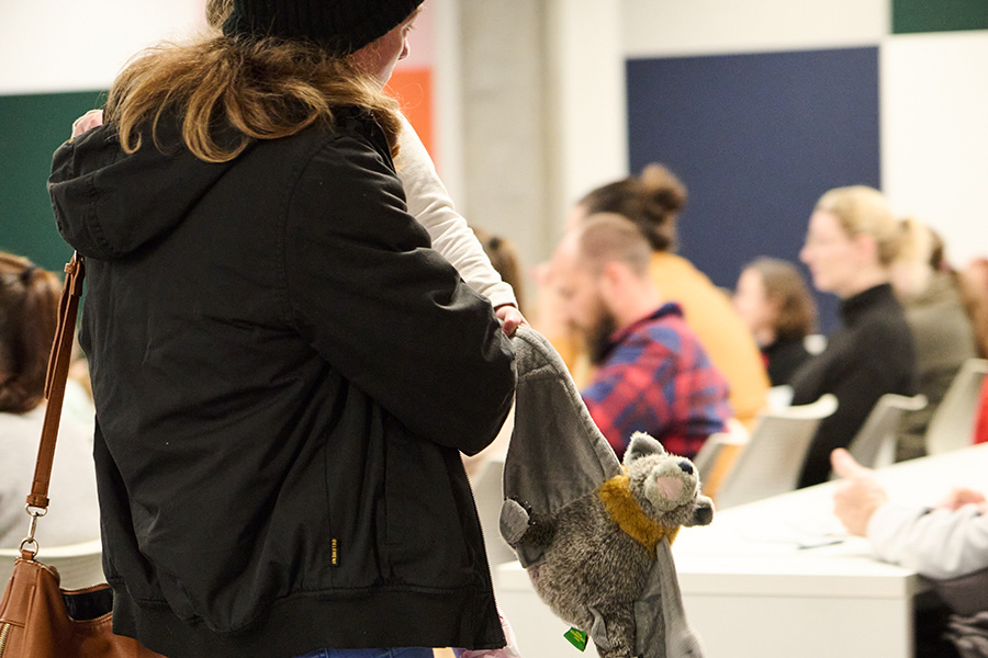 Young participant holding onto their plush bat toy at the International Bat Night at Port Macquarie campus