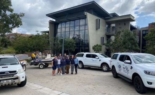 Members of the SARI program outside a building.