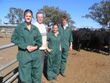 Left to right: First-year Veterinary Science students Luci Williams, Inverell; Steph Bullen, Geelong and Tom Loughnan, Geelong with Professor Kym Abbott and Angus cows. 