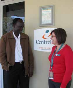 Third year Bachelor of Social Work student Mr John Mador with Centrelink's Ms Therese Jones-Mutton.