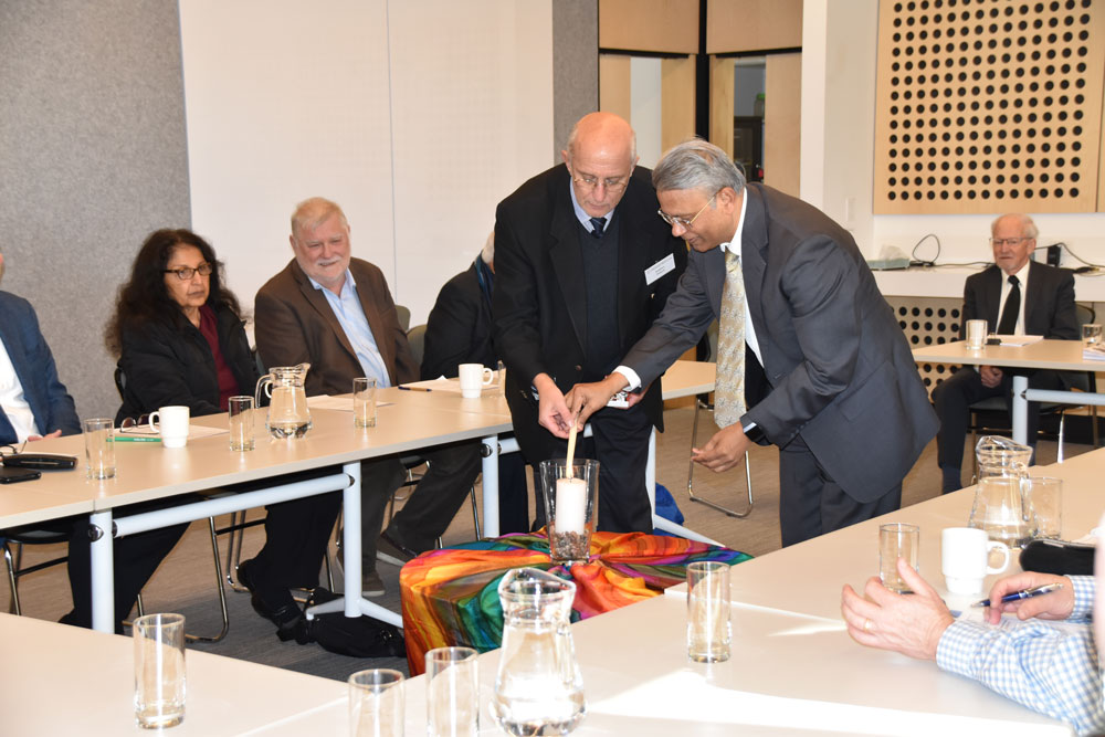 ACC&C Executive Director Rt Rev'd Professor Stephen Pickard and The High Commissioner of India, Dr R A Gondone light a candle at the start of the event