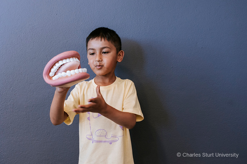 Child with a toy