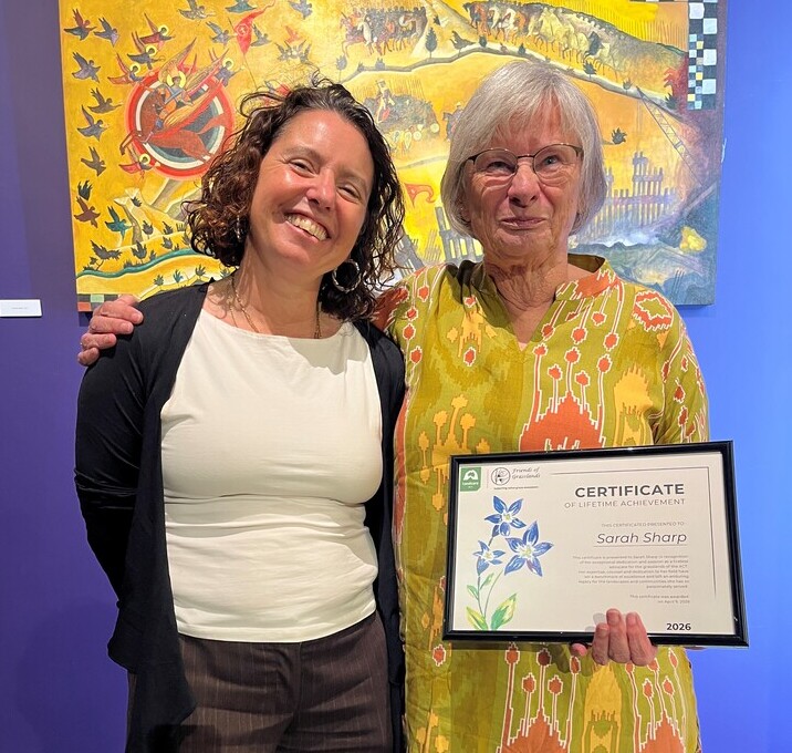 Photo of Vanessa Vassarotti and Sarah Sharp holding a certificate