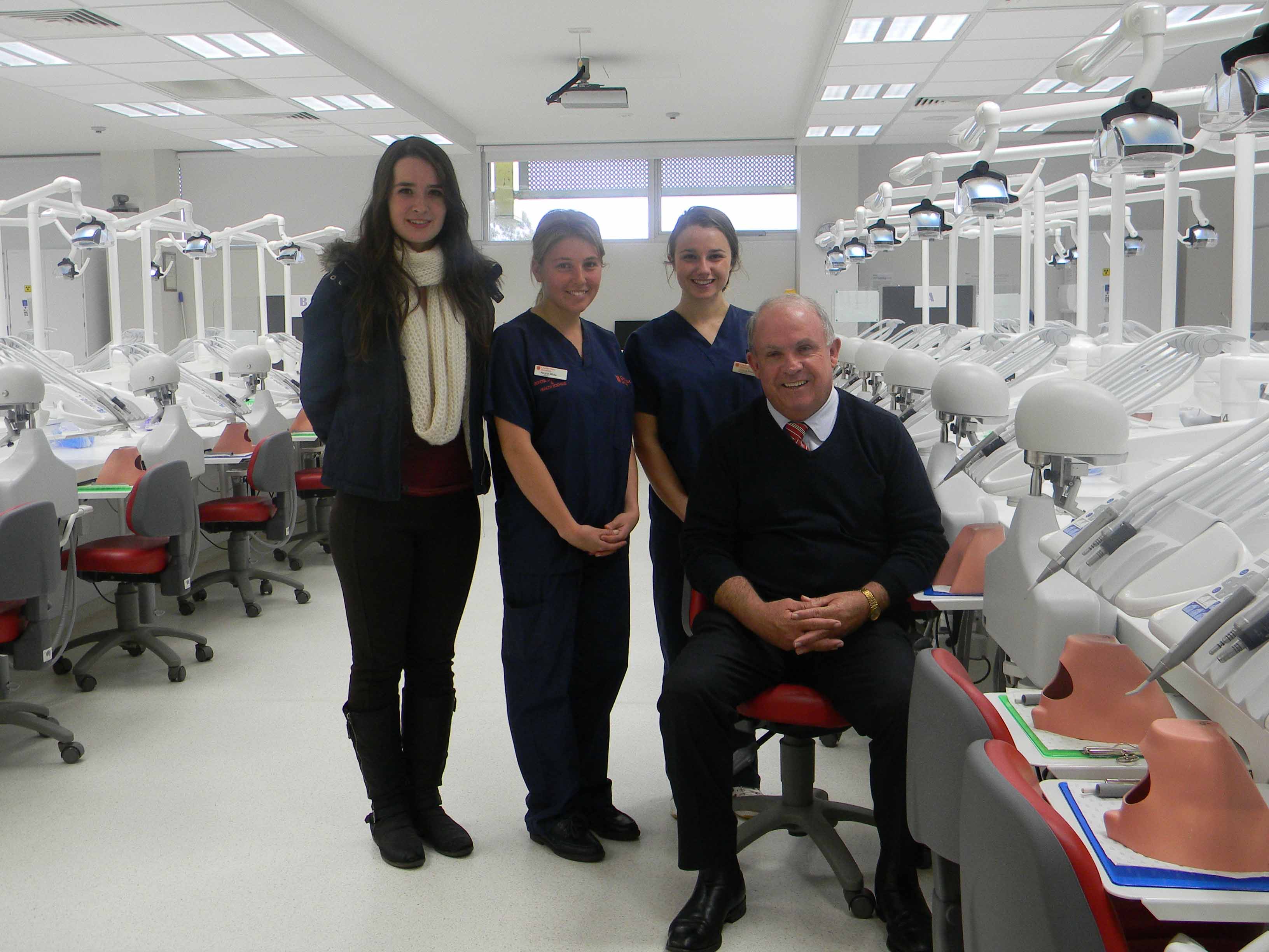 Nationals Senator Mr John Williams with rural dental scholarship recipients Ms Amelia Judson, Ms Alayne White and Ms Jessica Powell.