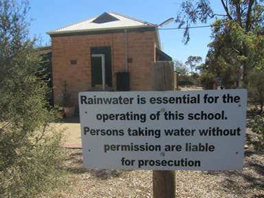 Sign about water outside school