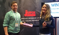 Mr Thomas O'Brien being presented with a stethoscope at the conference.