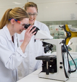 Student with microscope