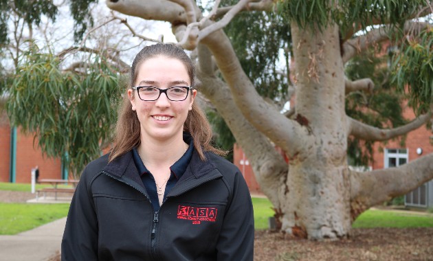 Graduating student’s research asks: Is it worth processing barley when feed lotting lambs?