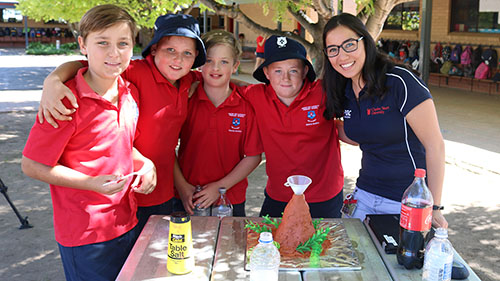 a photo of the volcano creation and students