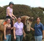 CSU equine science students with Buck the lead pony.